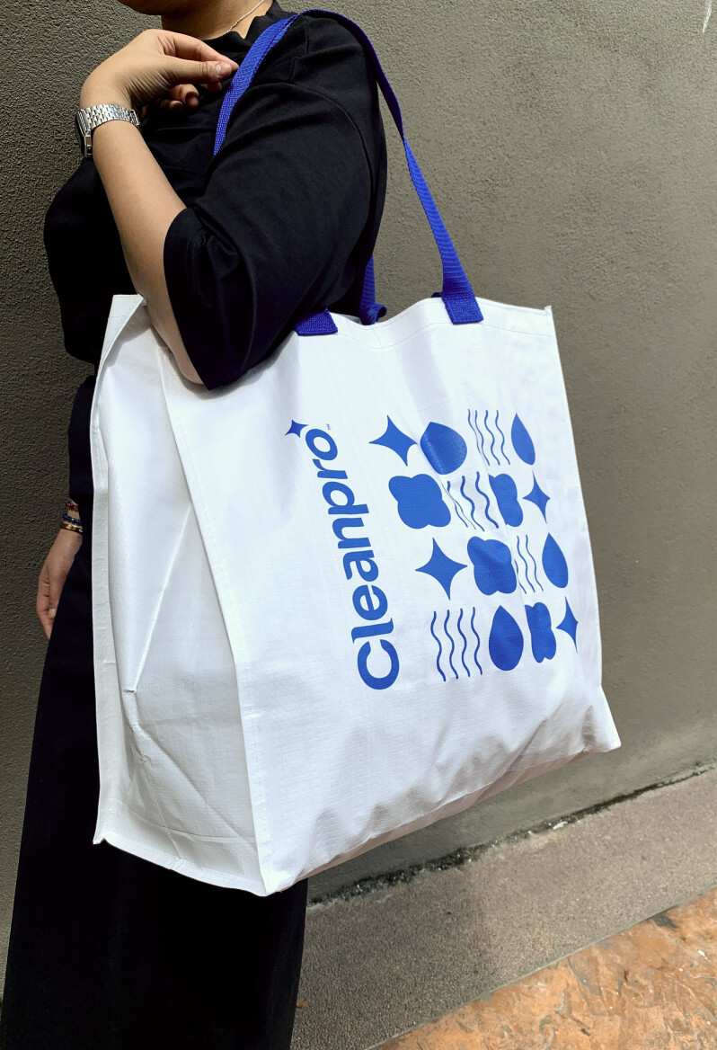 Model with Cleanpro White Designer Laundry Bag on her shoulder