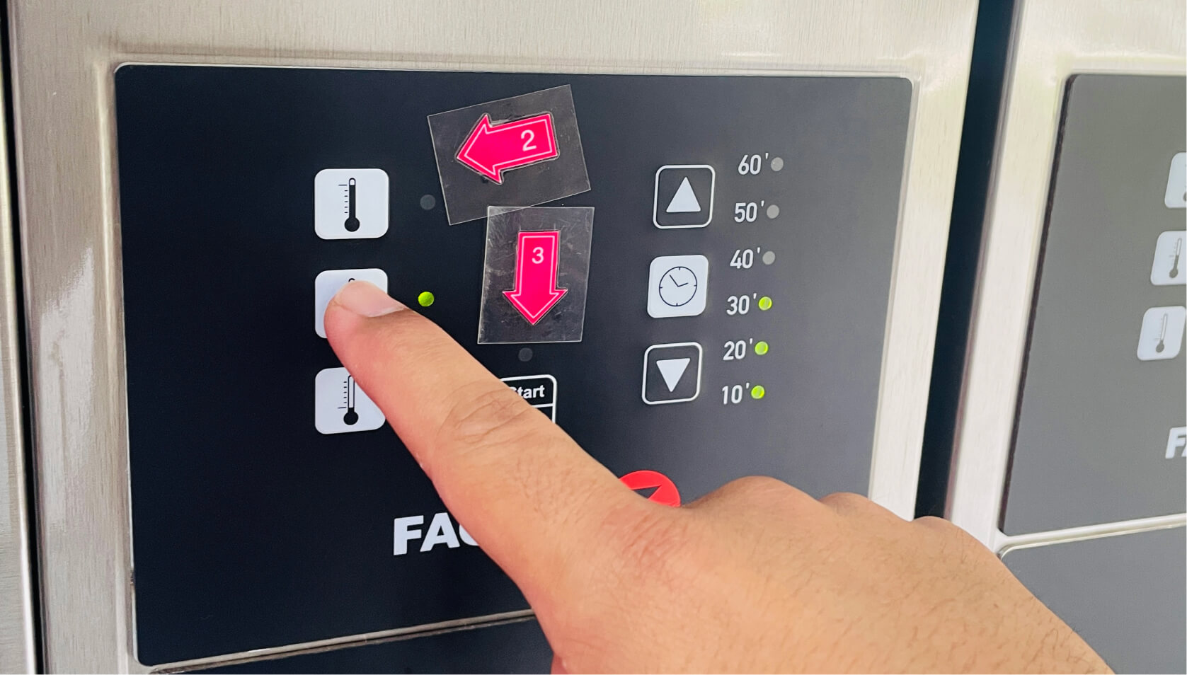 Cleanpro customer pressing the start button on Fagor dryer